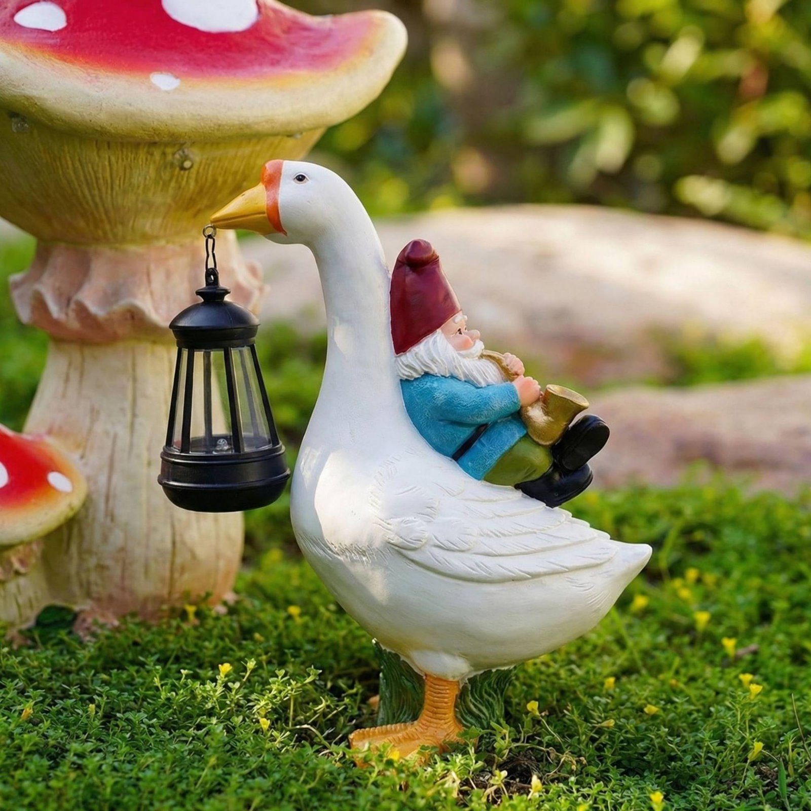 ノームがガチョウに乗る像 耐候性ガチョウソーラーランプ 屋外 - Resin Crafts のレビューと価格
